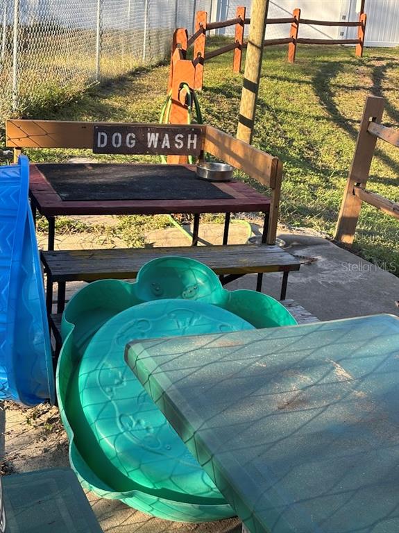 14403 Northeast 252nd Ct Road, Unit 128 Fort McCoy, FL 32134 - Photo 23 of 23 a view of swimming pool with a yard and sitting area