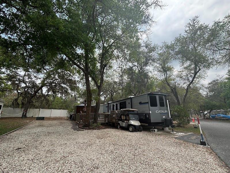 14403 Northeast 252nd Ct Road, Unit 128 Fort McCoy, FL 32134 - Photo 4 of 23 a view of house with a outdoor space
