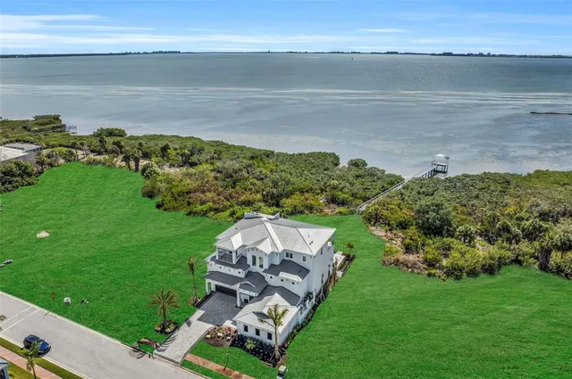 a view of a garden with an ocean beach