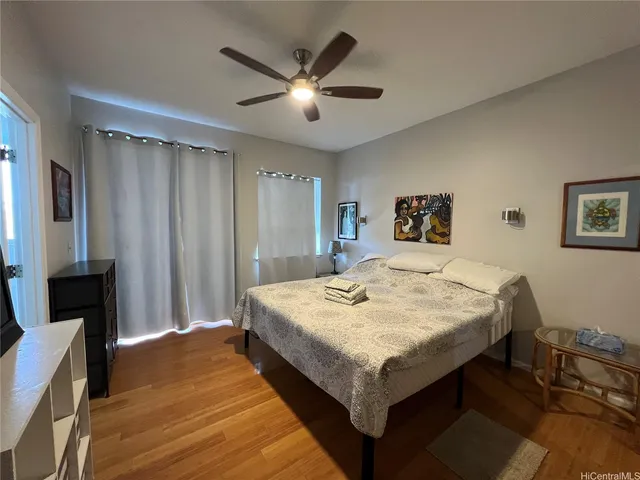a bathroom with a sink a shower and a mirror