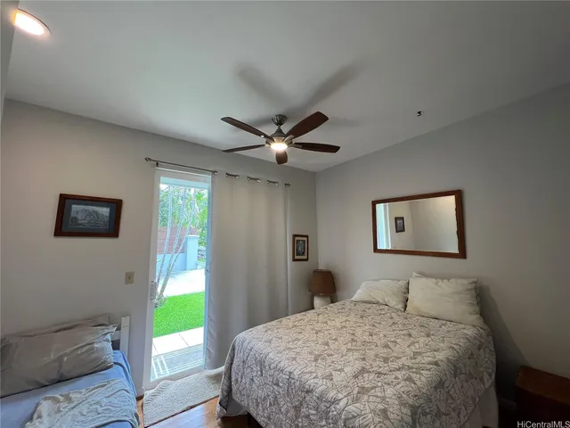 a bathroom with a sink double vanity granite tub and shower