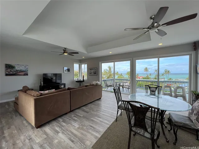 a kitchen with stainless steel appliances a refrigerator sink and cabinets