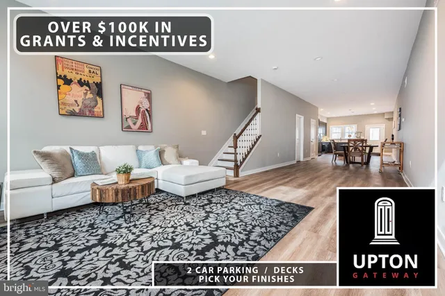 a living room with furniture and a dining table