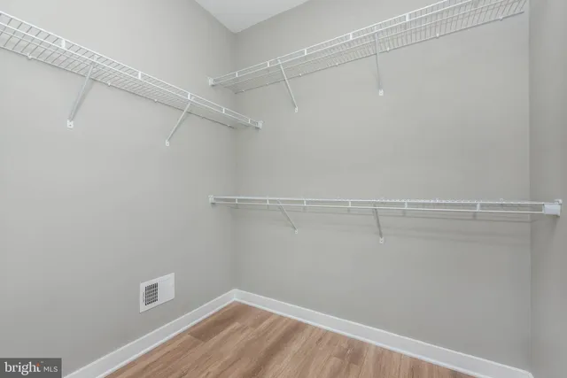 a view of a room with racks on the wall
