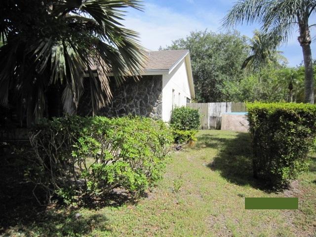 5809 Autumn Ridge Road Lake Worth, FL 33463 - Photo 3 of 7 Side Exterior