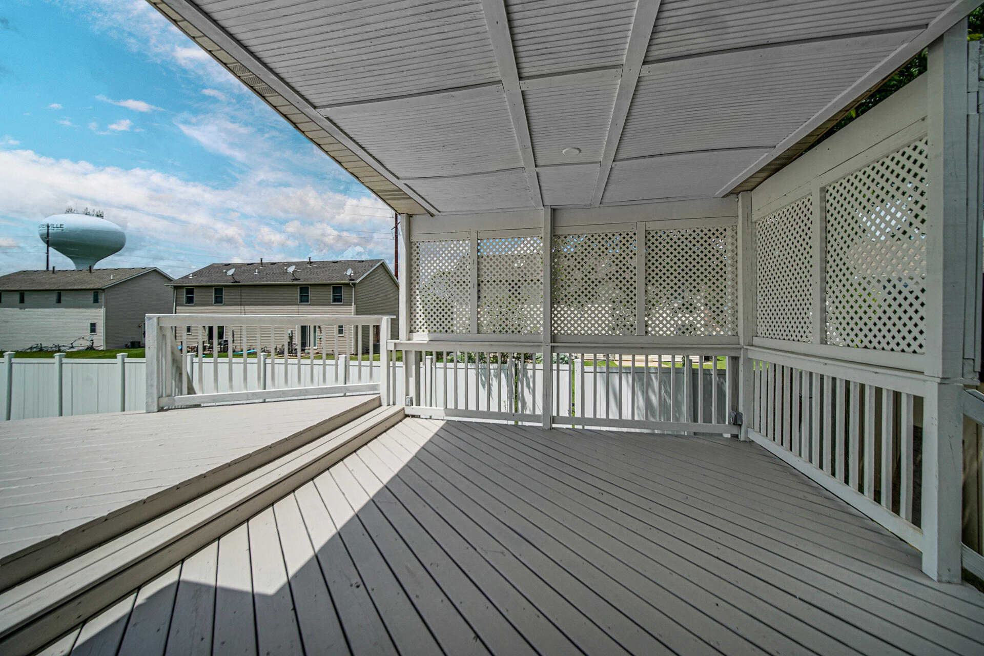 4942 West 93rd Court Crown Point, IN 46307 - Photo 31 of 37 a view of a balcony with wooden floor
