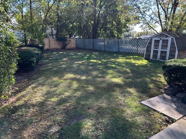 a view of a backyard with a garden