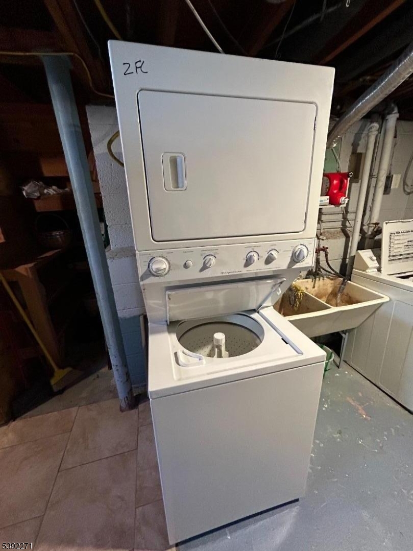 85 Valley Road Clark, NJ 07066 - Photo 5 of 5 a utility room with dryer and washer