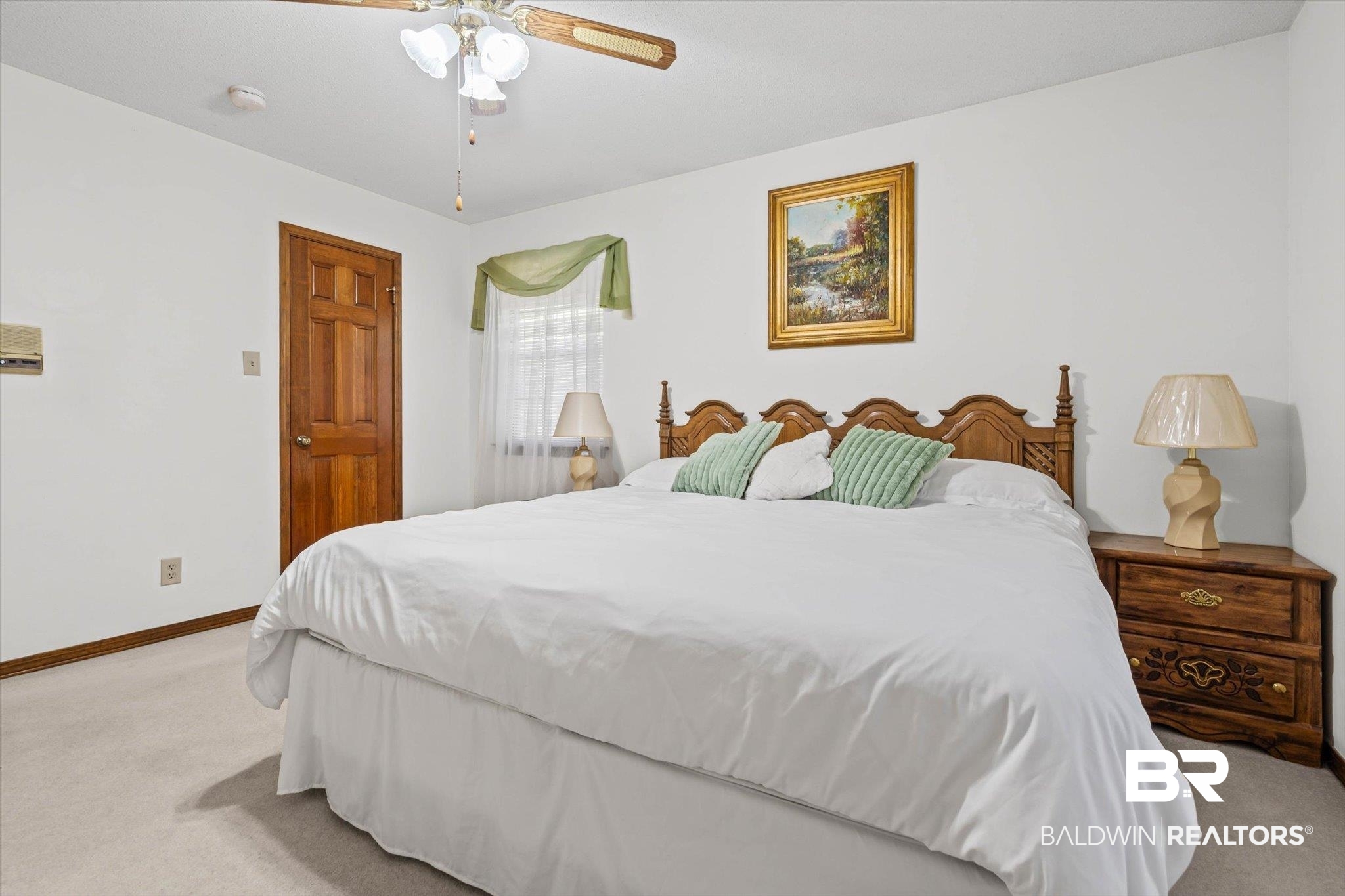 1900 Foxfire Road Mobile, AL 36618 - Photo 23 of 36 Bedroom with light colored carpet and ceiling fan