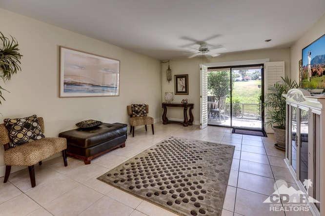 72399 Ridgecrest Lane Palm Desert, CA 92260 - Photo 12 of 34 a living room with furniture and a rug