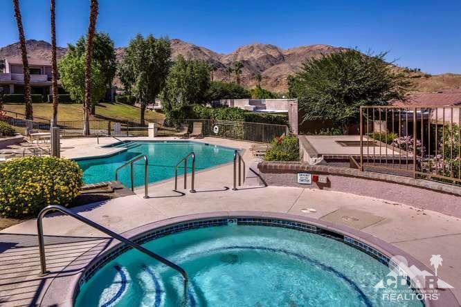 72399 Ridgecrest Lane Palm Desert, CA 92260 - Photo 2 of 34 a view of a backyard with sitting area