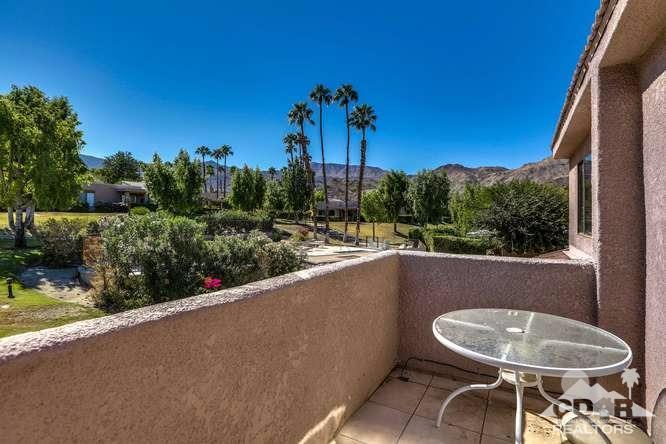 72399 Ridgecrest Lane Palm Desert, CA 92260 - Photo 27 of 34 a view of a chairs and table in patio
