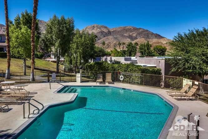 72399 Ridgecrest Lane Palm Desert, CA 92260 - Photo 34 of 34 a view of a swimming pool with a patio