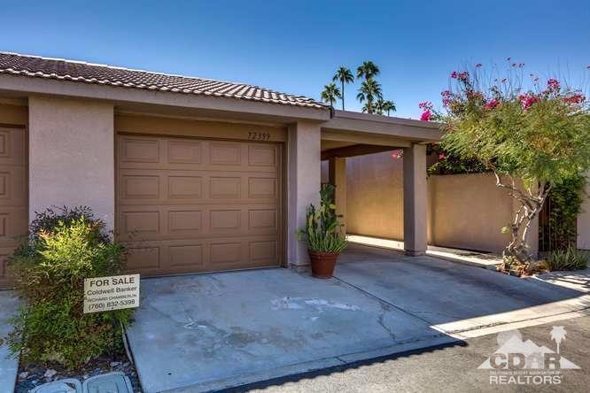 72399 Ridgecrest Lane Palm Desert, CA 92260 - Photo 4 of 34 a view of entryway with a flower pot