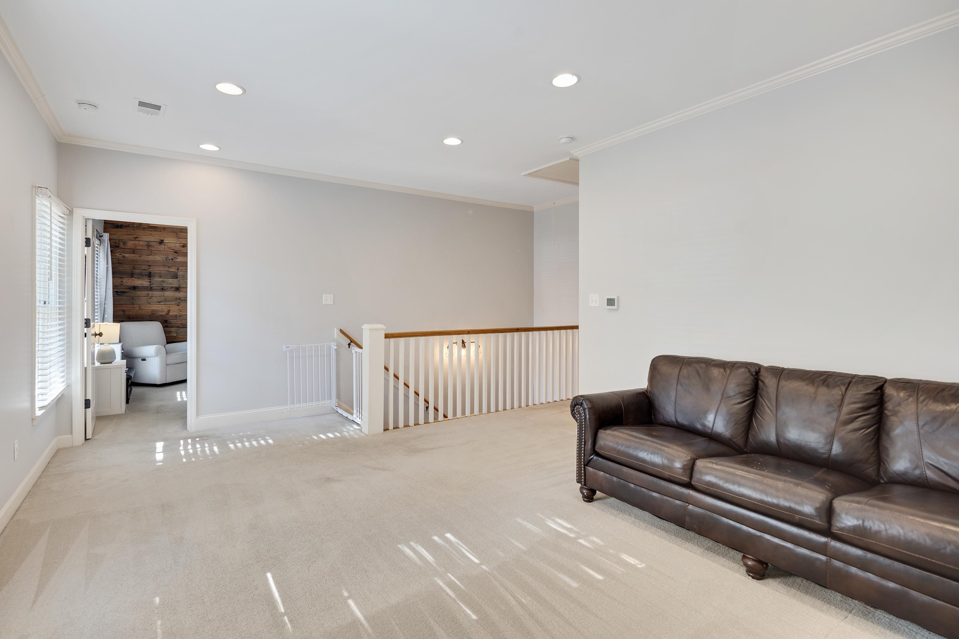 237 Windover Road Memphis, TN 38111 - Photo 23 of 37 Living room with ornamental molding, recessed lighting, and light carpet