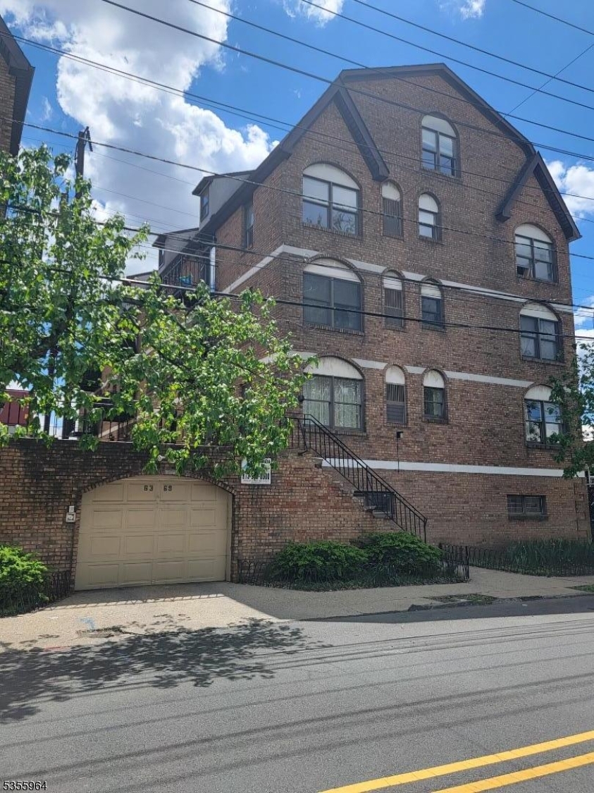 63 Rome Street Newark, NJ 07105 - Photo 2 of 11 a view of a building