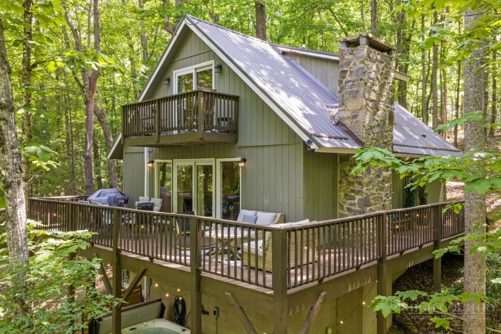 216 Saddle Lane Deep Gap, NC 28618 - Photo 1 of 44 a front view of a house with balcony