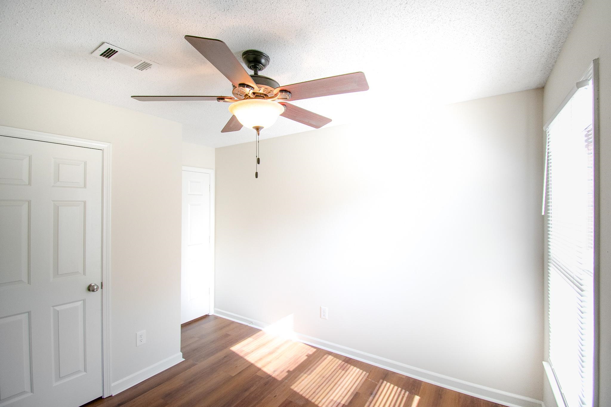 6756 Martha's Point Memphis, TN 38141 - Photo 10 of 15 a view of a ceiling fan in a closet