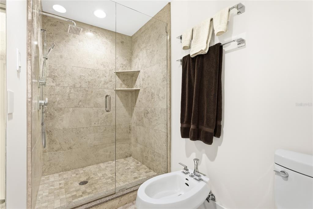 455 Longboat Club Road, Unit 408 Longboat Key, FL 34228 - Photo 16 of 58 a bathroom with a shower and a sink