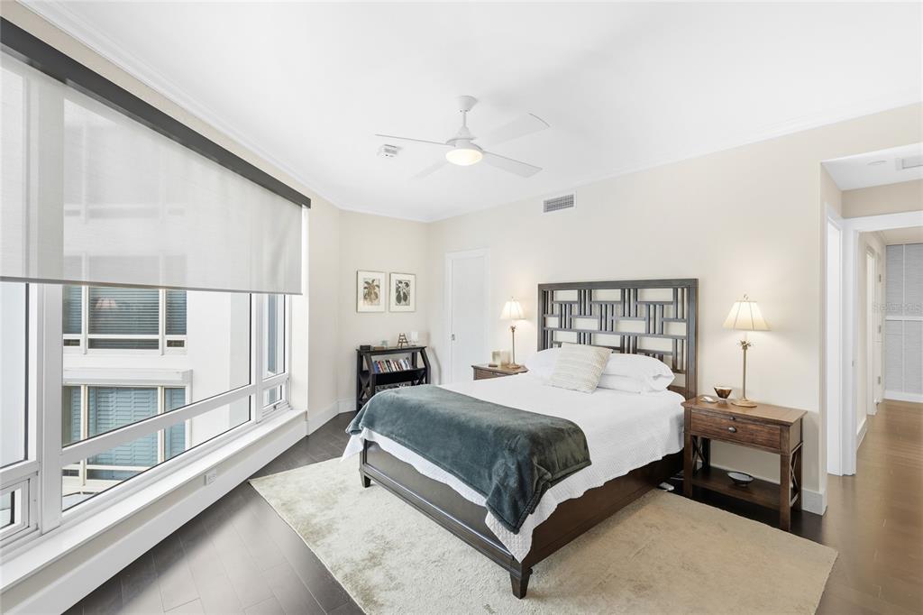 455 Longboat Club Road, Unit 408 Longboat Key, FL 34228 - Photo 22 of 58 a bedroom with a bed and window