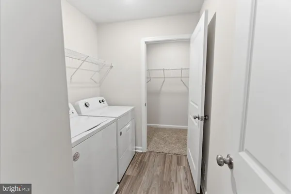 a room with a bed and a window