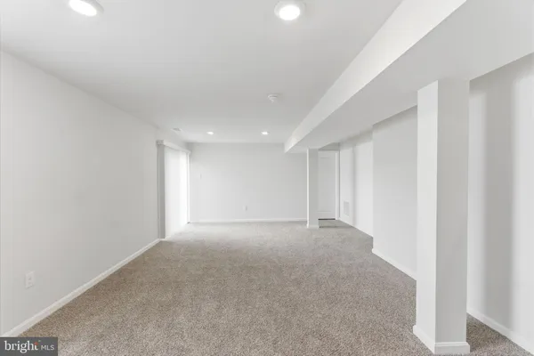 a view of swimming pool from a balcony