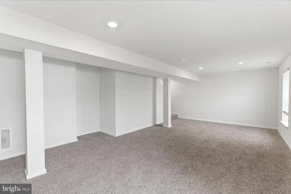 a front view of a house with a yard and porch