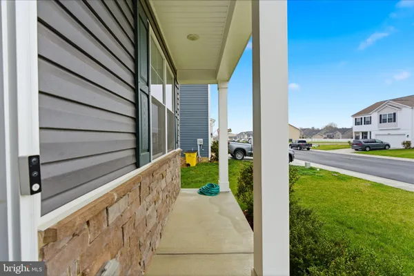 a front view of house with garden
