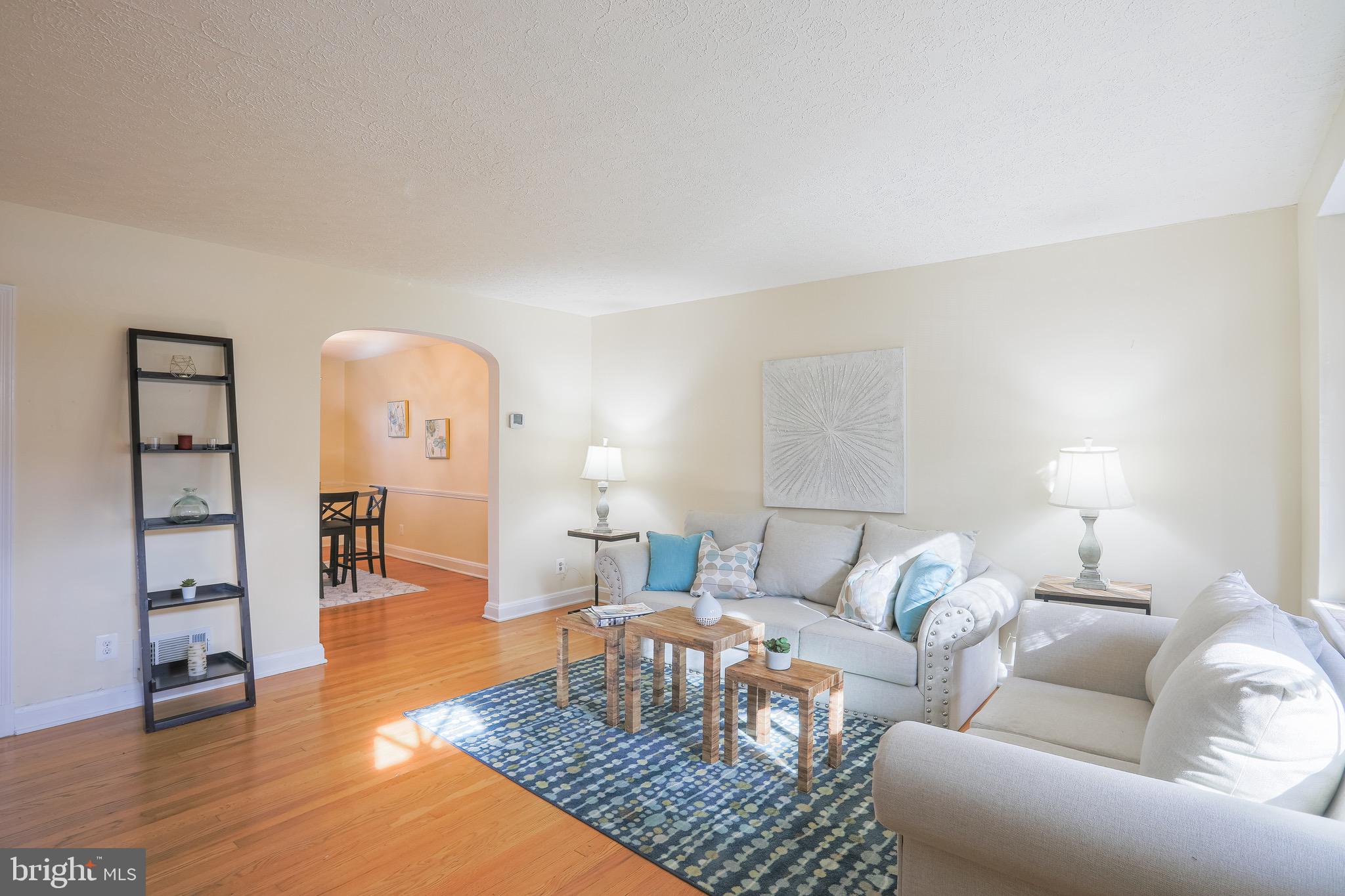 200 Stanmore Road Baltimore, MD 21212 - Photo 4 of 27 a living room with furniture and wooden floor