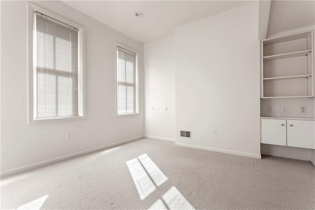 326 Hailman Street Pittsburgh, PA 15206 - Photo 14 of 22 a view of an empty room with a window