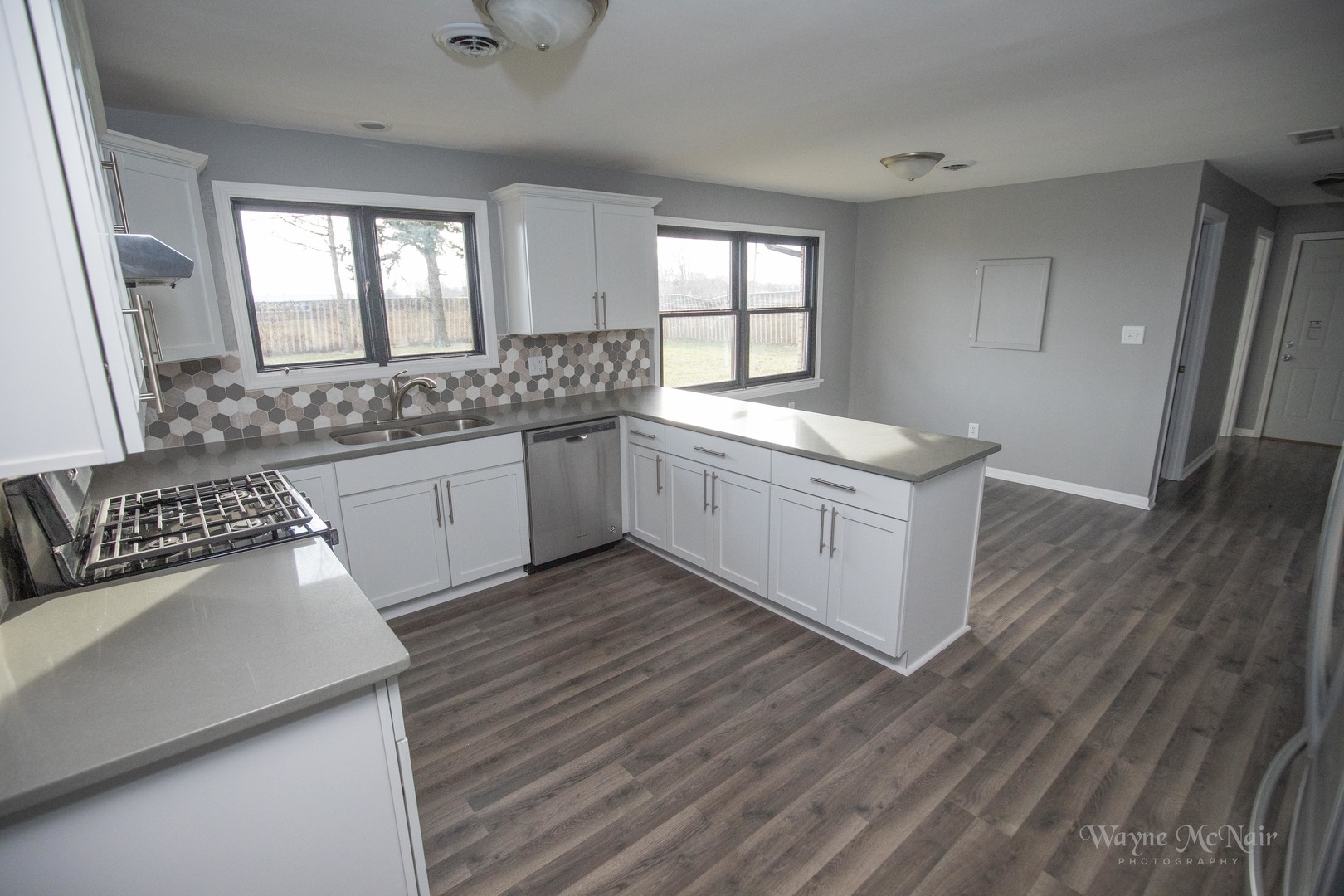 408 Hillside Road Joliet, IL 60433 - Photo 7 of 14 a kitchen with a sink stove and cabinets