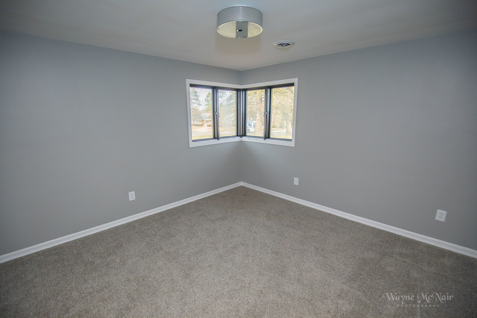 408 Hillside Road Joliet, IL 60433 - Photo 9 of 14 an empty room with a window