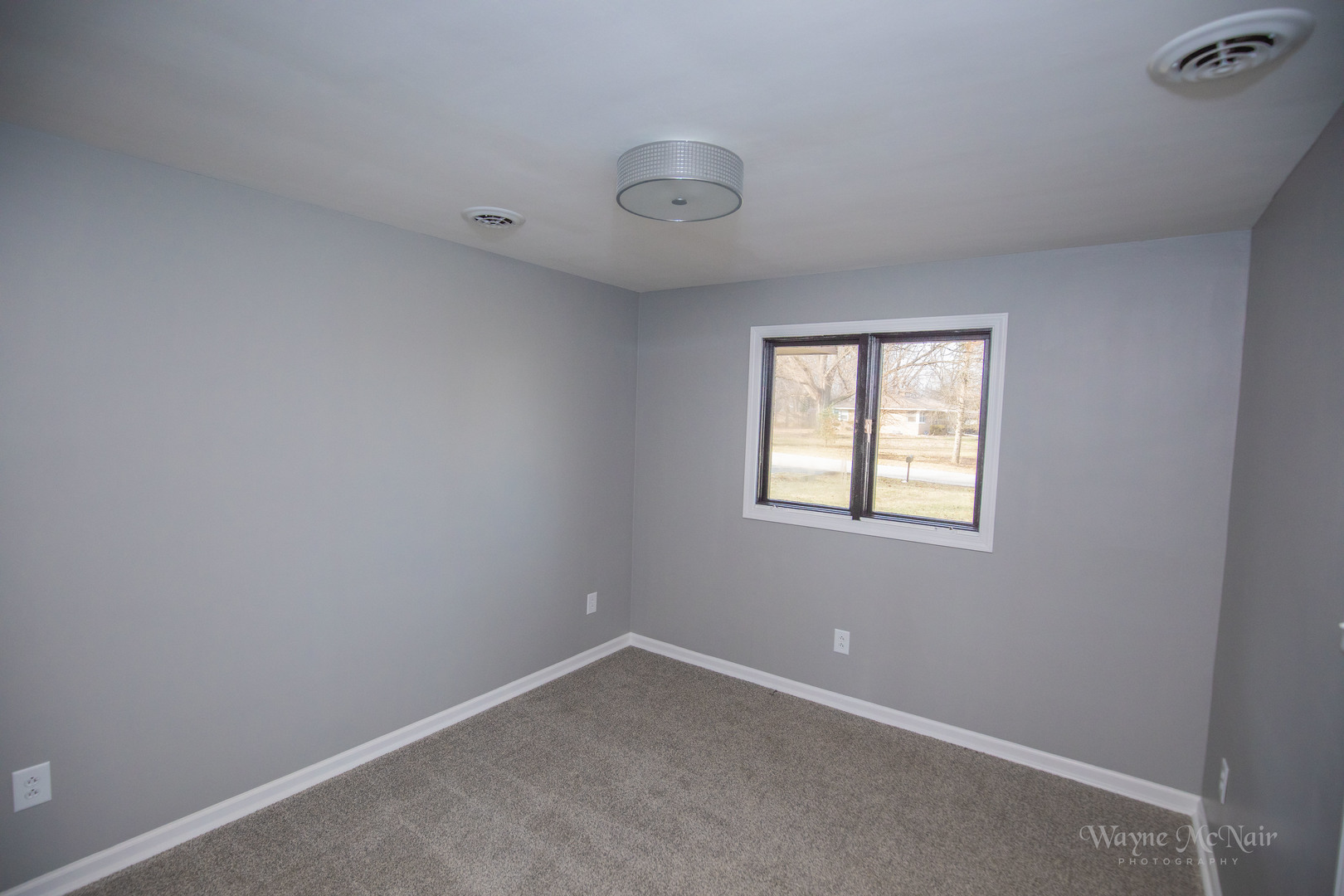 408 Hillside Road Joliet, IL 60433 - Photo 10 of 14 an empty room with a window