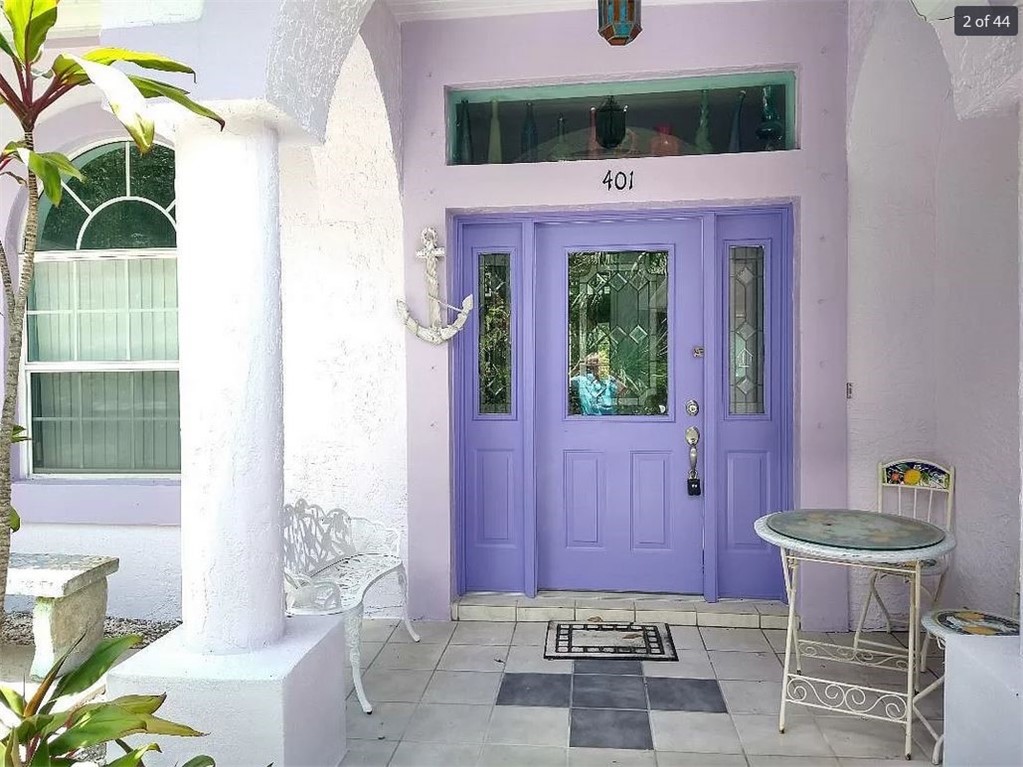 401 Coply Terrace Sebastian, FL 32958 - Photo 2 of 36 a front view of a house with outdoor seating