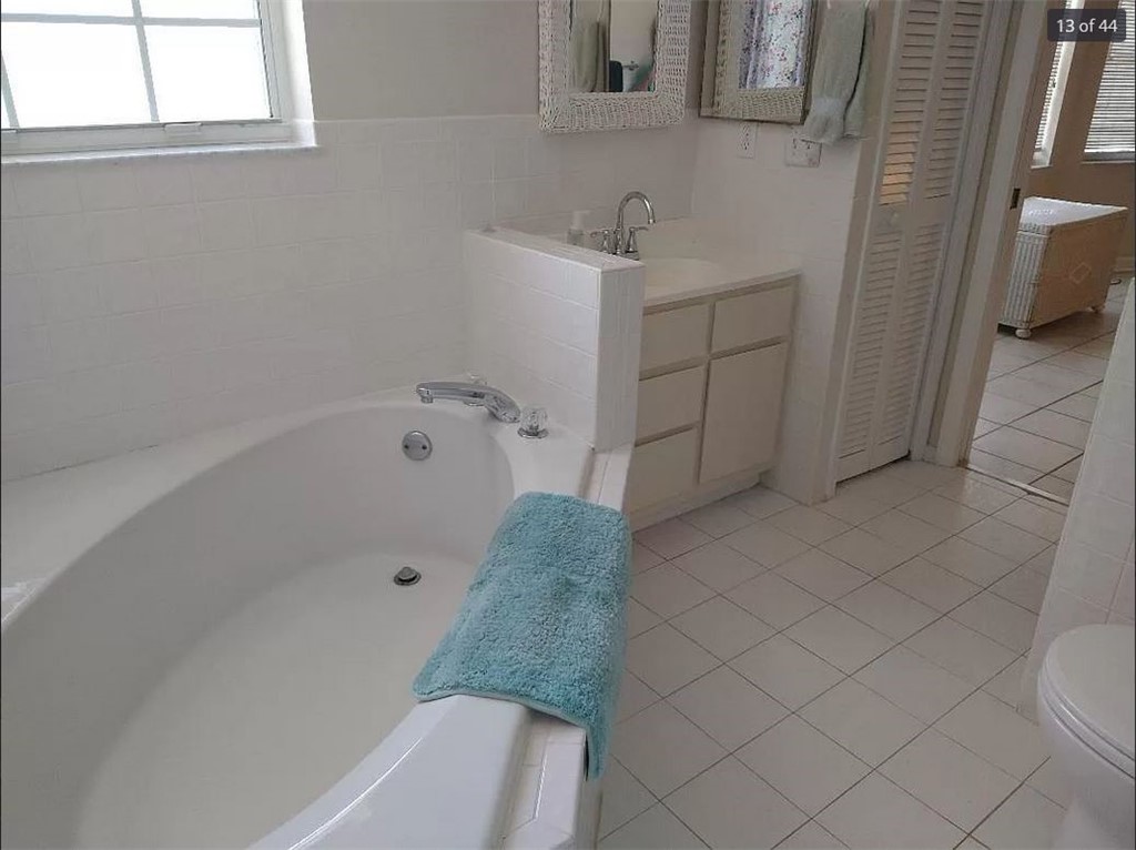 401 Coply Terrace Sebastian, FL 32958 - Photo 21 of 36 a bathroom with a bathtub and shower