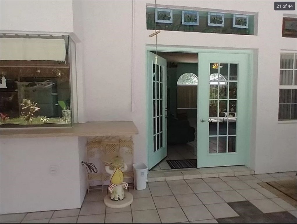 401 Coply Terrace Sebastian, FL 32958 - Photo 23 of 36 a view of a brick house with entryway