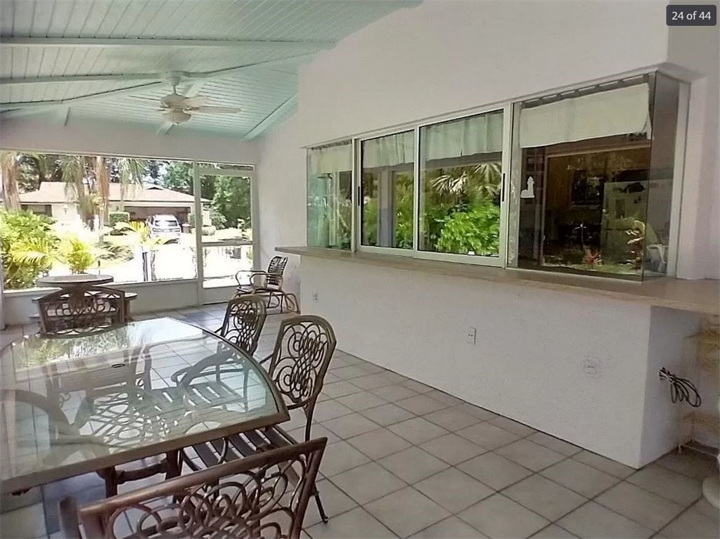 401 Coply Terrace Sebastian, FL 32958 - Photo 26 of 36 a view of a dining room with furniture window and outside view