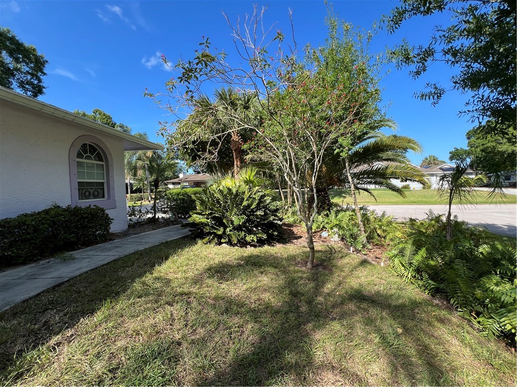 401 Coply Terrace Sebastian, FL 32958 - Photo 31 of 36 a view of a garden with a house