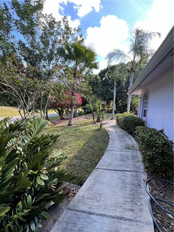 401 Coply Terrace Sebastian, FL 32958 - Photo 34 of 36 a view of a backyard with sitting area