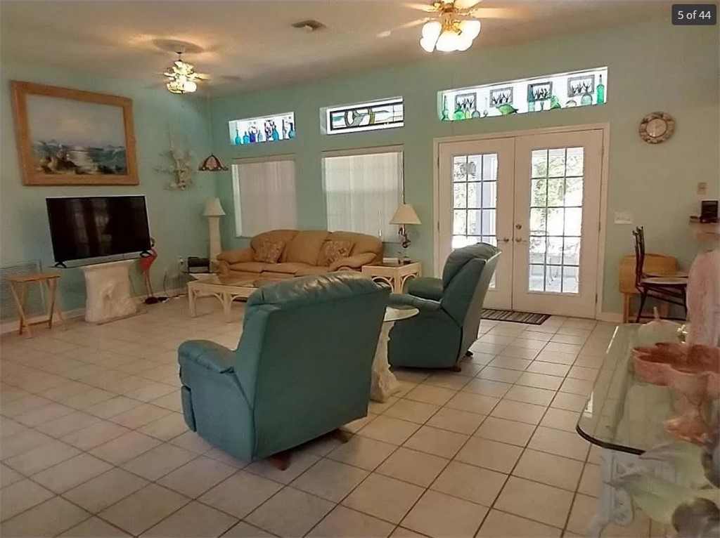 401 Coply Terrace Sebastian, FL 32958 - Photo 6 of 36 a living room with furniture and a window