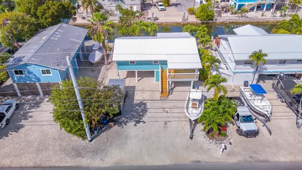 an aerial view of a house with garden
