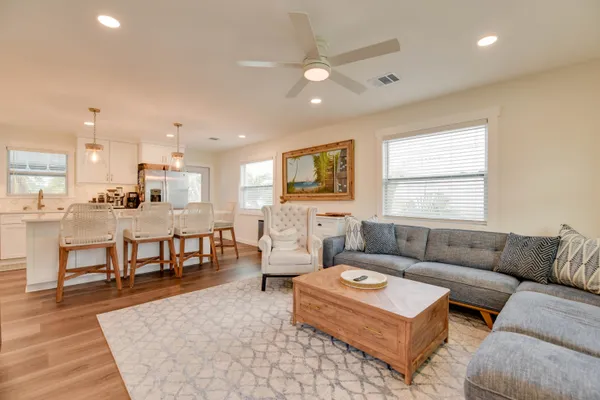 a living room with furniture and a table