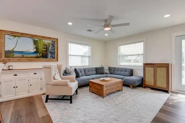 a bedroom with furniture and a window