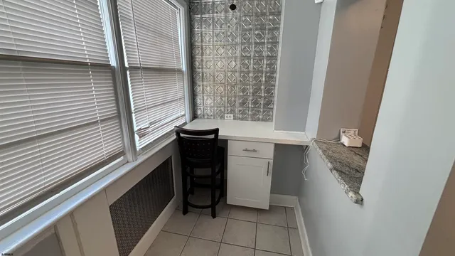 a bathroom with a bathtub and sink