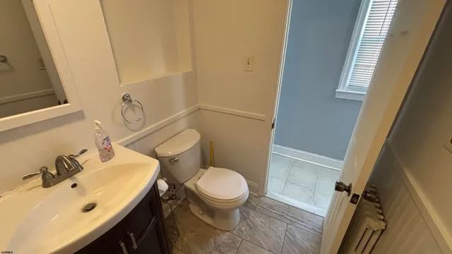 a bathroom with a sink and a toilet