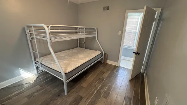 a bedroom with bunk bed