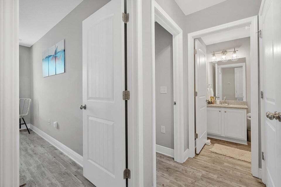 89 Crossing Lane, Unit F Santa Rosa Beach, FL 32459 - Photo 17 of 30 a view of a bathroom from the hallway