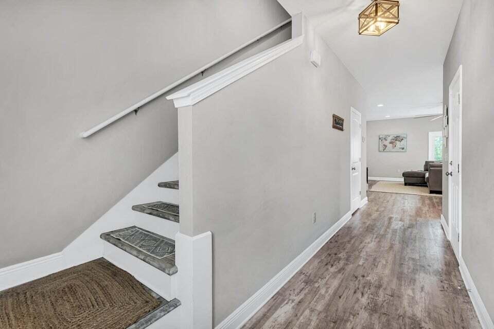 89 Crossing Lane, Unit F Santa Rosa Beach, FL 32459 - Photo 2 of 30 a view of hallway with wooden floor