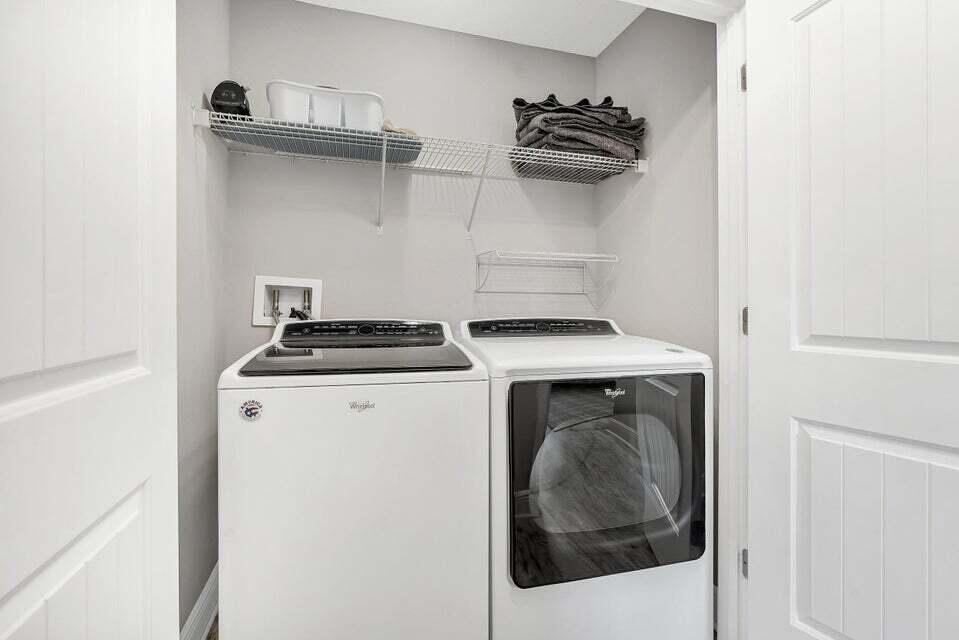 89 Crossing Lane, Unit F Santa Rosa Beach, FL 32459 - Photo 23 of 30 a utility room with dryer and washer