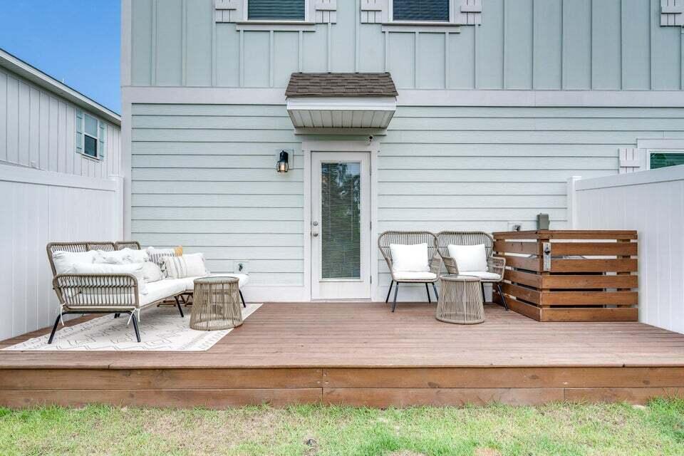 89 Crossing Lane, Unit F Santa Rosa Beach, FL 32459 - Photo 24 of 30 a view of backyard with seating space